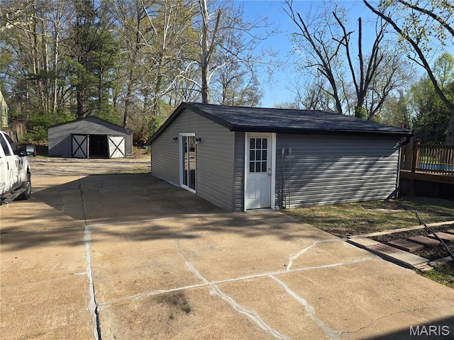 view of outbuilding featuring an outdoor structure