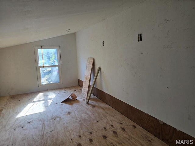 bonus room with vaulted ceiling