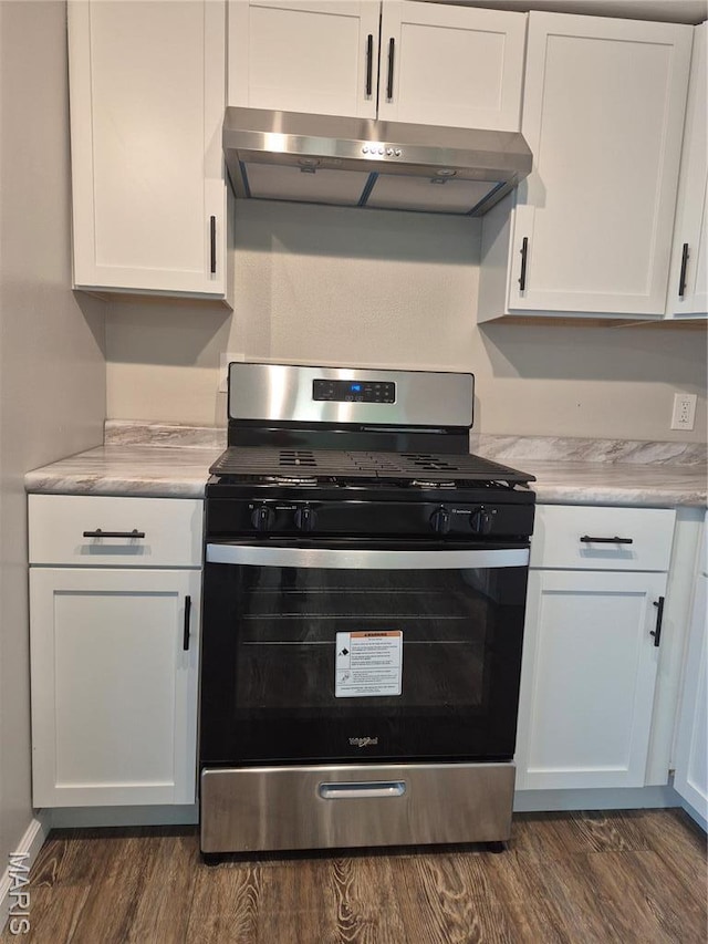 2205 Miracle Ave, Granite City, IL 62040 - kitchen featuring stainless steel gas range, under cabinet range hood, white cabinets, and light countertops