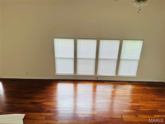 698 Carriage Ln, Hazelwood, MO 63042 - empty room featuring hardwood / wood-style flooring, baseboards, and a ceiling fan