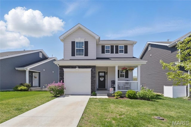 view of front of house featuring covered porch, driveway, a front yard, and an attached garage