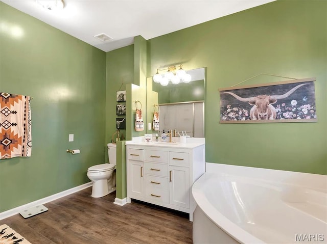 535 Vista Hills Ct, Eureka, MO 63025 - full bathroom featuring vanity, a shower stall, toilet, a bath, and wood finished floors