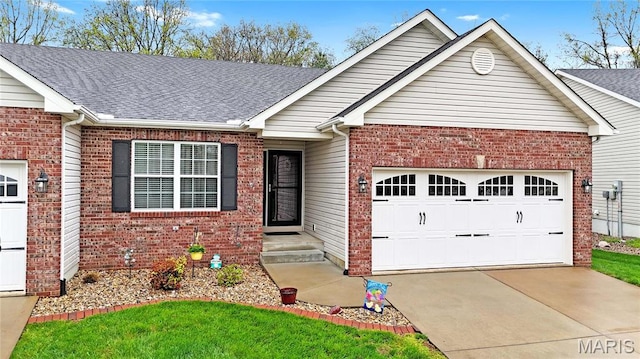 ranch-style house featuring brick siding, a garage, roof with shingles, and concrete driveway