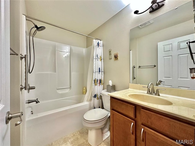 bathroom with toilet, shower / bath combo with shower curtain, and vanity
