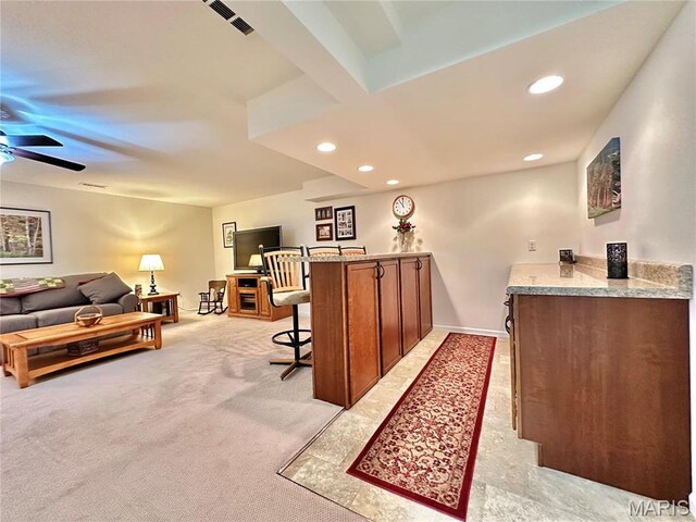 indoor bar with recessed lighting and ceiling fan