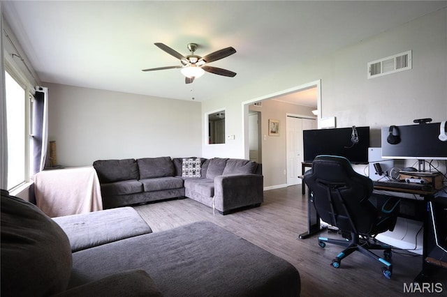 90 La Sierra Dr, Florissant, MO 63031 - home office featuring wood finished floors, ceiling fan, and baseboards