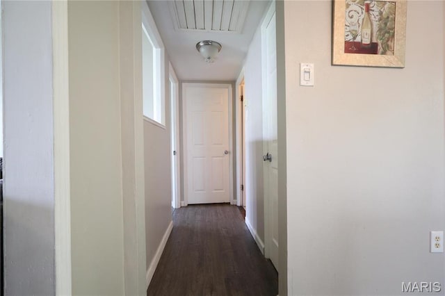 90 La Sierra Dr, Florissant, MO 63031 - corridor with baseboards and dark wood-style floors