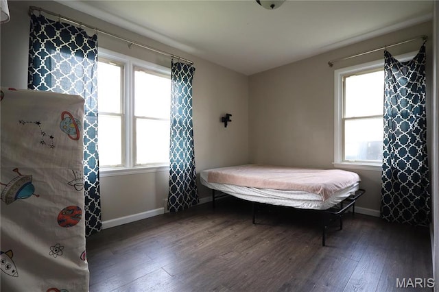 90 La Sierra Dr, Florissant, MO 63031 - bedroom with hardwood / wood-style floors and baseboards