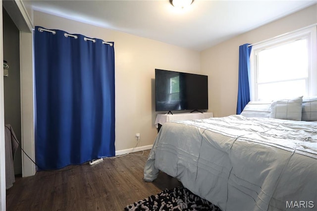 90 La Sierra Dr, Florissant, MO 63031 - bedroom with wood finished floors and baseboards
