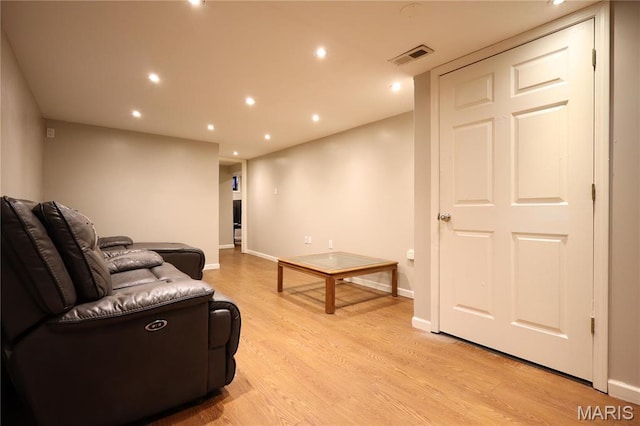 90 La Sierra Dr, Florissant, MO 63031 - living room with light wood-type flooring, recessed lighting, and baseboards