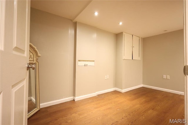 90 La Sierra Dr, Florissant, MO 63031 - finished below grade area with light wood-style floors, baseboards, and recessed lighting