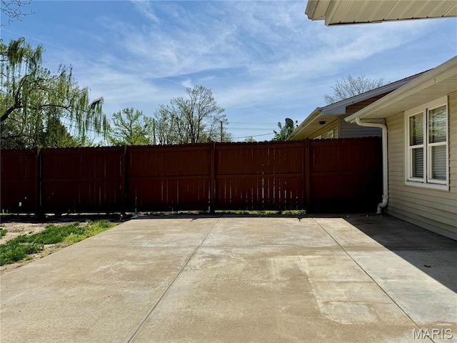 view of patio / terrace featuring fence