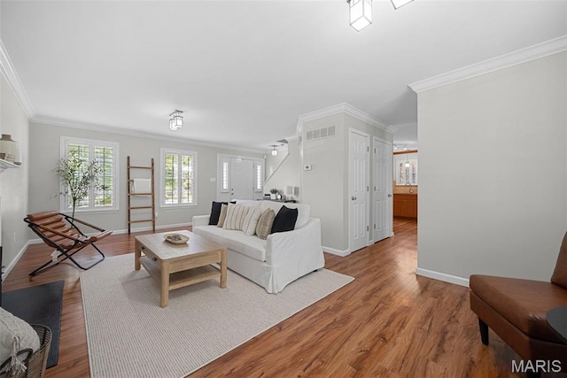 35 Heatherwood Ct, Ofallon, MO 63368 - living room featuring crown molding and wood finished floors
