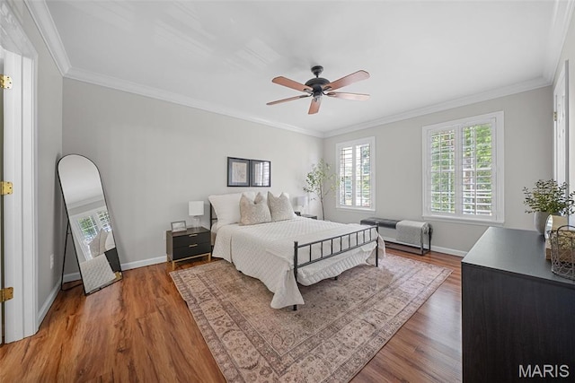 35 Heatherwood Ct, Ofallon, MO 63368 - bedroom featuring multiple windows, wood finished floors, crown molding, and ceiling fan