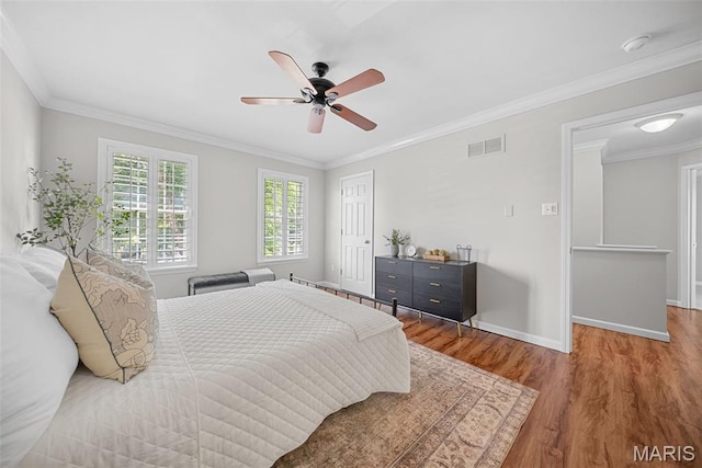 35 Heatherwood Ct, Ofallon, MO 63368 - bedroom featuring wood finished floors, a closet, crown molding, and a ceiling fan