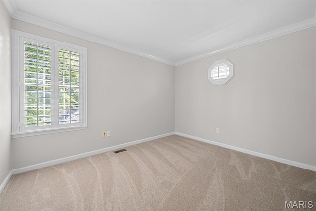 35 Heatherwood Ct, Ofallon, MO 63368 - spare room with carpet, healthy amount of natural light, and crown molding