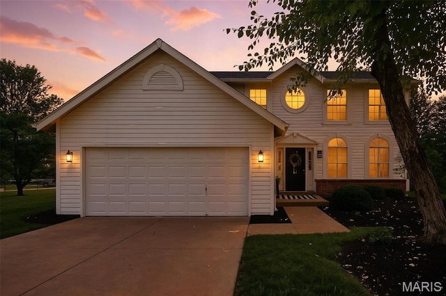 35 Heatherwood Ct, Ofallon, MO 63368 - view of front of home featuring concrete driveway, a garage, and brick siding