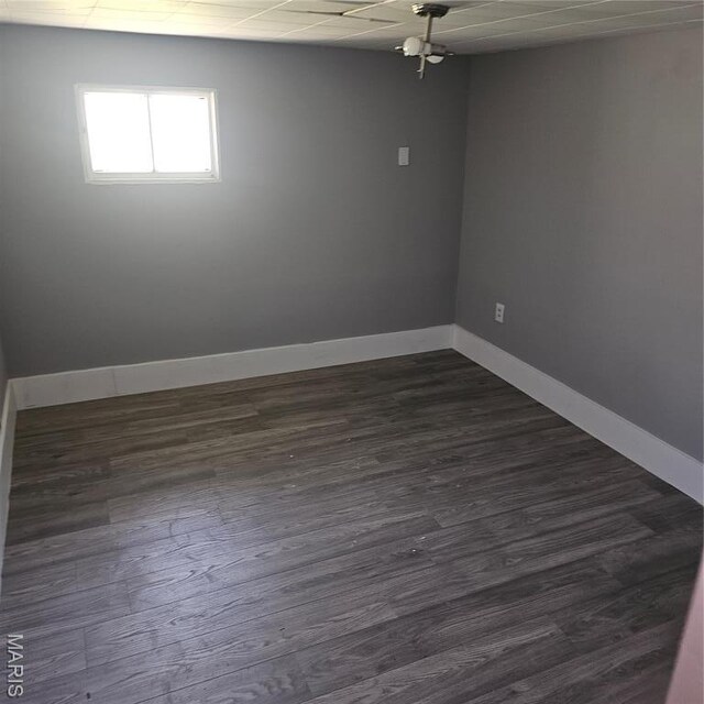 6336 Laura Ave, Saint Louis, MO 63136 - spare room with baseboards and dark wood-style flooring