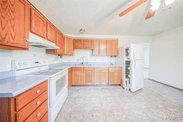 1407 Ramsey Place Rd, Rolla, MO 65401 - kitchen featuring under cabinet range hood, white appliances, a sink, a ceiling fan, and light countertops