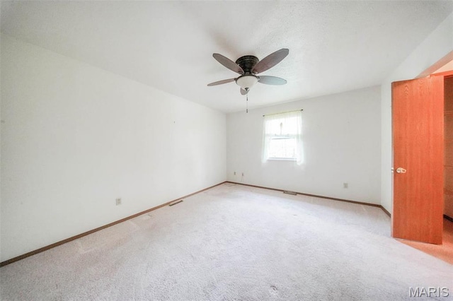 1407 Ramsey Place Rd, Rolla, MO 65401 - carpeted spare room with a ceiling fan and baseboards