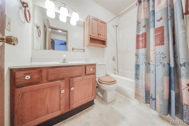 1407 Ramsey Place Rd, Rolla, MO 65401 - bathroom featuring shower / bath combo, toilet, and vanity