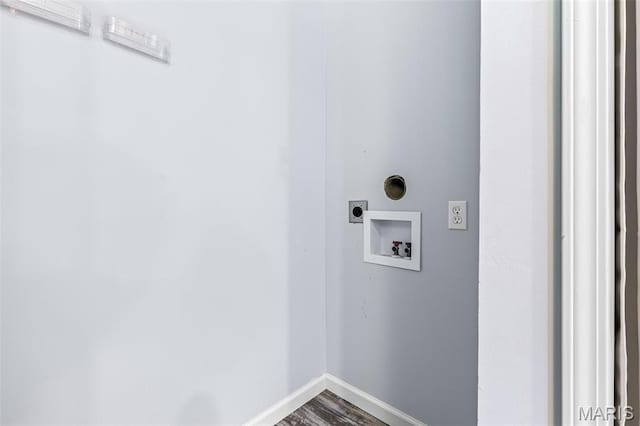 10179 Cherry Hill Ln, Potosi, MO 63664 - clothes washing area featuring hookup for an electric dryer, baseboards, hookup for a washing machine, and dark wood-type flooring