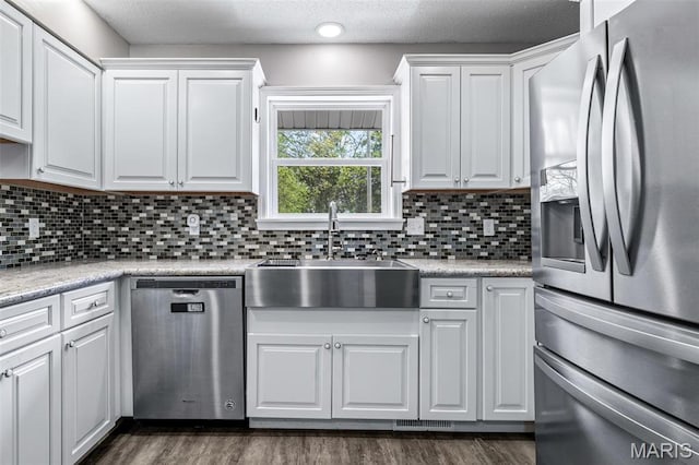 10179 Cherry Hill Ln, Potosi, MO 63664 - kitchen featuring stainless steel appliances, a sink, white cabinets, and light countertops