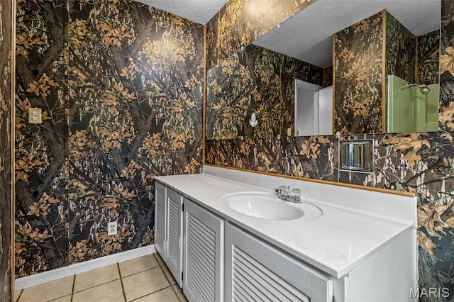 10179 Cherry Hill Ln, Potosi, MO 63664 - bathroom with a textured ceiling, wallpapered walls, tile patterned flooring, vanity, and baseboards