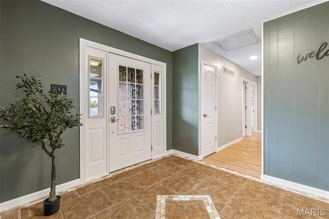 1304 Napoleon Dr, Bonne Terre, MO 63628 - entrance foyer with a textured ceiling and baseboards