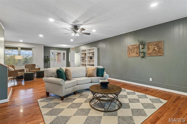 1304 Napoleon Dr, Bonne Terre, MO 63628 - living room featuring a ceiling fan, wood finished floors, recessed lighting, and baseboards