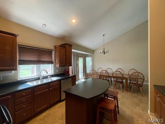 11 Summers Dr, Hawk Point, MO 63349 - kitchen featuring stainless steel dishwasher, dark countertops, a sink, healthy amount of natural light, and vaulted ceiling