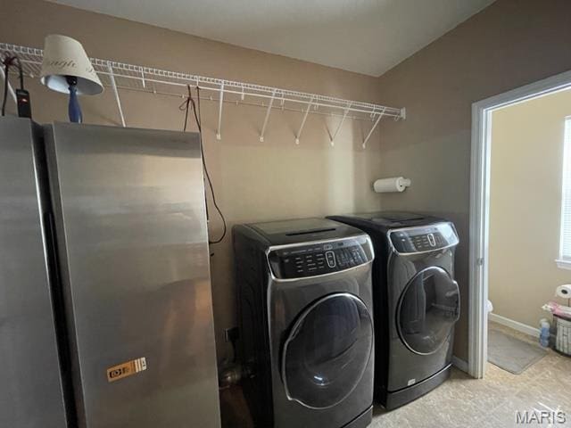 11 Summers Dr, Hawk Point, MO 63349 - laundry area featuring separate washer and dryer and baseboards