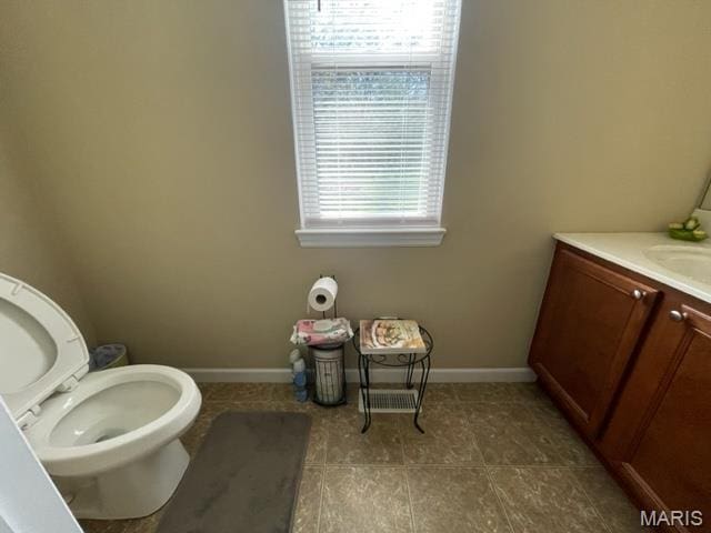 11 Summers Dr, Hawk Point, MO 63349 - half bathroom with tile patterned flooring, toilet, baseboards, and vanity