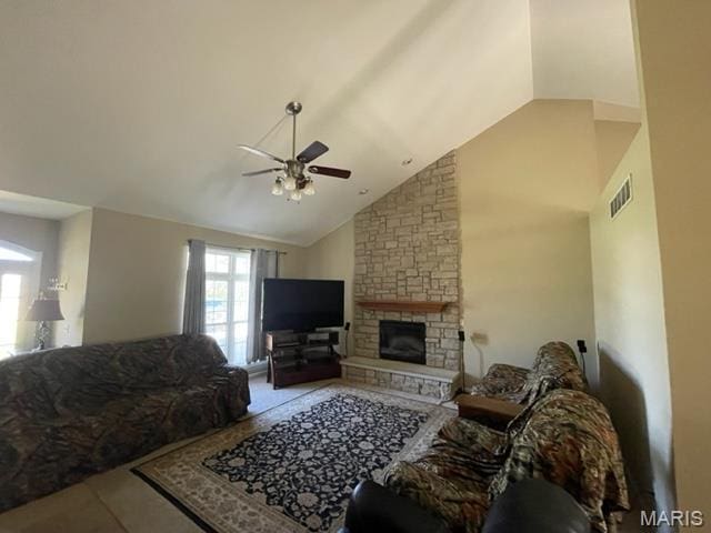 11 Summers Dr, Hawk Point, MO 63349 - living area with high vaulted ceiling, ceiling fan, and a stone fireplace