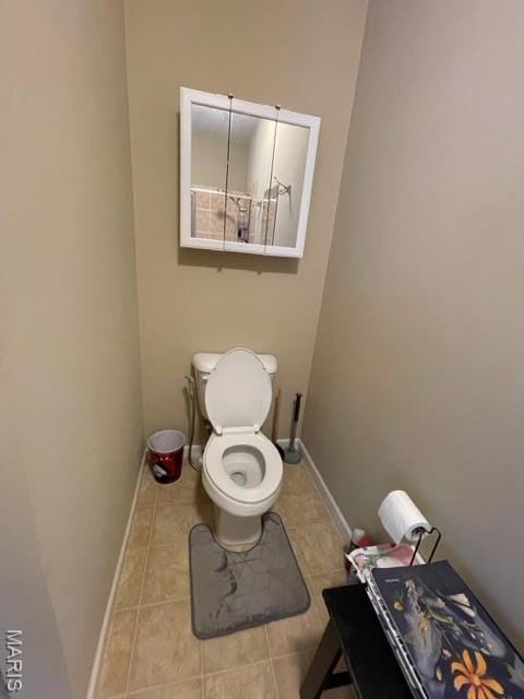 11 Summers Dr, Hawk Point, MO 63349 - bathroom featuring baseboards, tile patterned flooring, and toilet