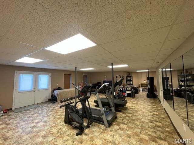 11 Summers Dr, Hawk Point, MO 63349 - workout room featuring a paneled ceiling and tile patterned floors