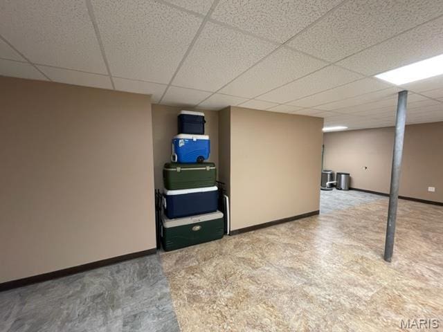 11 Summers Dr, Hawk Point, MO 63349 - finished below grade area featuring a paneled ceiling, baseboards, and carpet floors