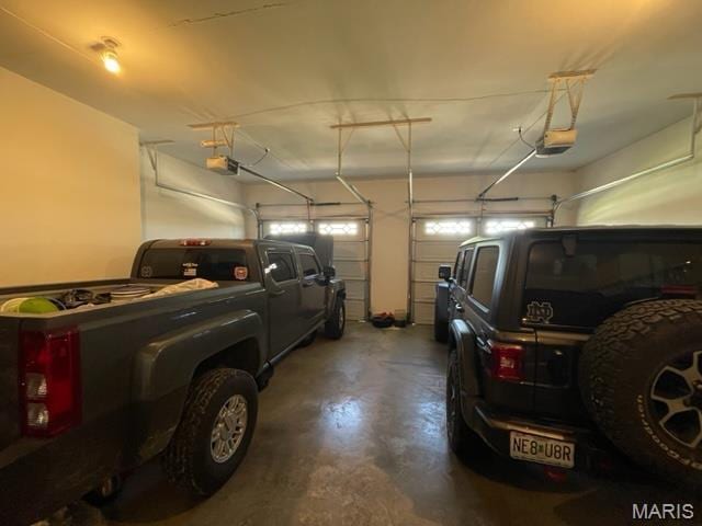 11 Summers Dr, Hawk Point, MO 63349 - garage featuring a garage door opener