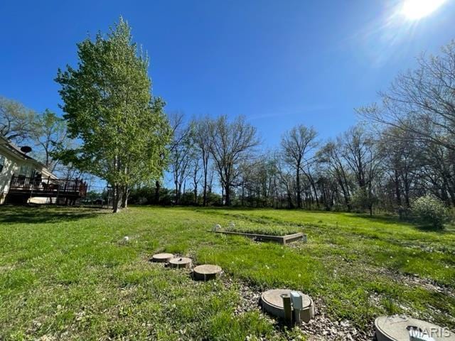 11 Summers Dr, Hawk Point, MO 63349 - view of grassy yard with a deck