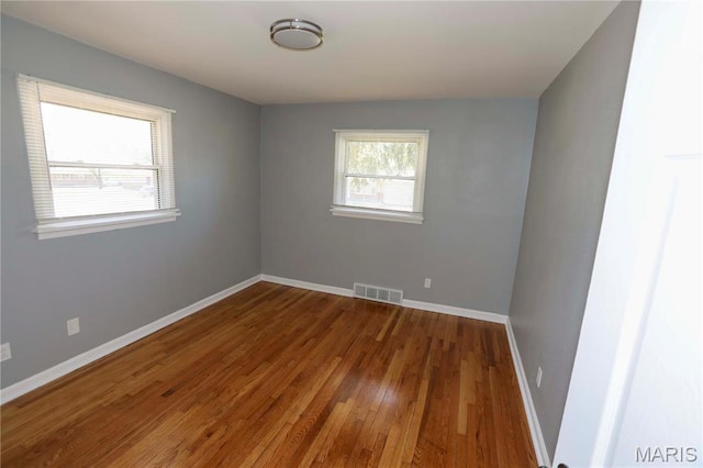6616 Dunwold Dr, Saint Louis, MO 63134 - spare room with wood finished floors and baseboards
