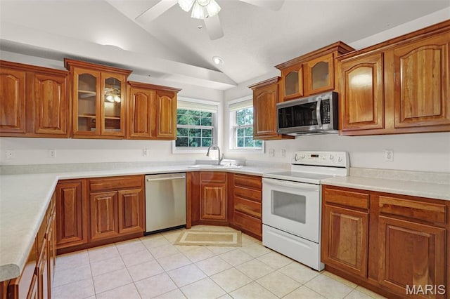 14 Berry Patch Ln, Glen Carbon, IL 62034 - kitchen with appliances with stainless steel finishes, lofted ceiling, ceiling fan, a sink, and brown cabinets