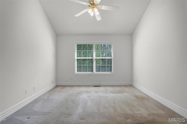 14 Berry Patch Ln, Glen Carbon, IL 62034 - carpeted empty room with lofted ceiling, a ceiling fan, and baseboards