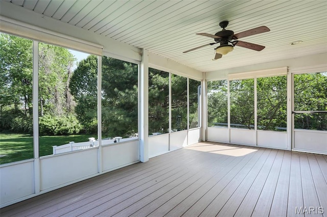 14 Berry Patch Ln, Glen Carbon, IL 62034 - unfurnished sunroom with a ceiling fan and view of scattered trees
