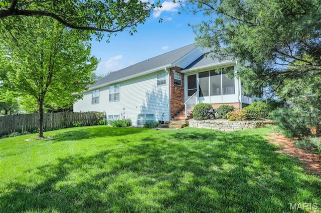 14 Berry Patch Ln, Glen Carbon, IL 62034 - back of house with a sunroom and brick siding