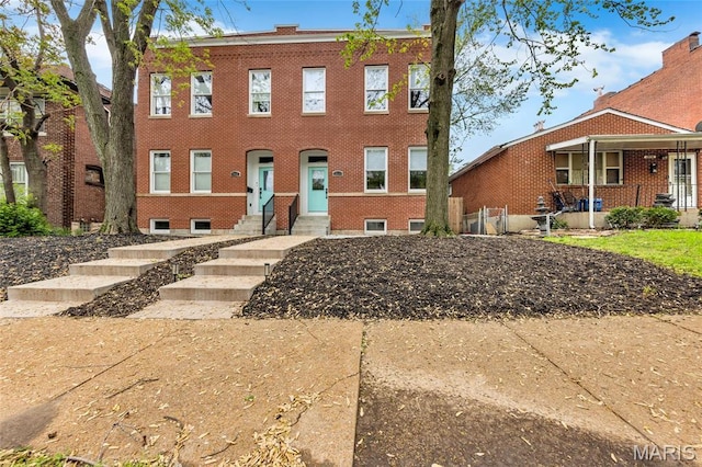 2034 Ann Ave, Saint Louis, MO 63104 - view of front of home with entry steps and brick siding