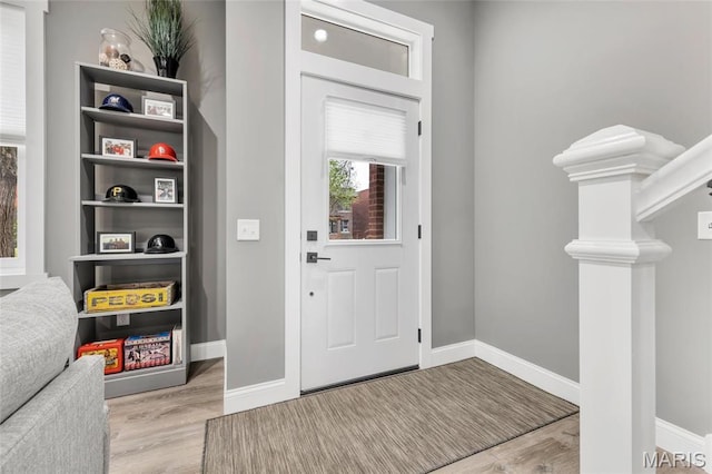 2034 Ann Ave, Saint Louis, MO 63104 - entrance foyer featuring wood finished floors and baseboards