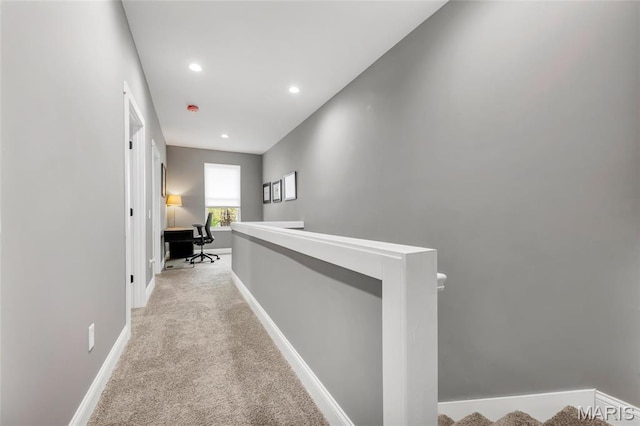 2034 Ann Ave, Saint Louis, MO 63104 - corridor with light carpet, baseboards, recessed lighting, an upstairs landing, and an office area