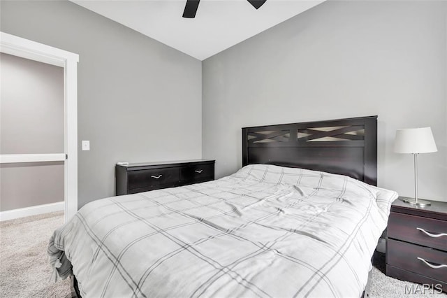 2034 Ann Ave, Saint Louis, MO 63104 - bedroom with vaulted ceiling, carpet floors, baseboards, and a ceiling fan
