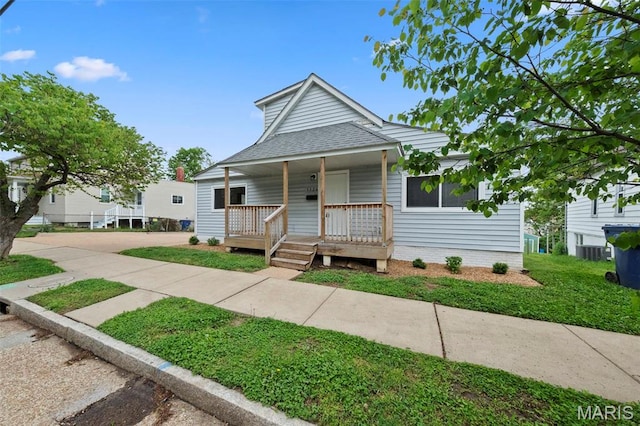 1326 Graham St, Saint Louis, MO 63139 - view of front of home featuring a porch and roof with shingles