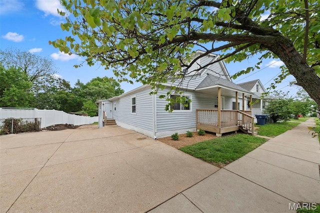 1326 Graham St, Saint Louis, MO 63139 - view of side of property with fence and a deck